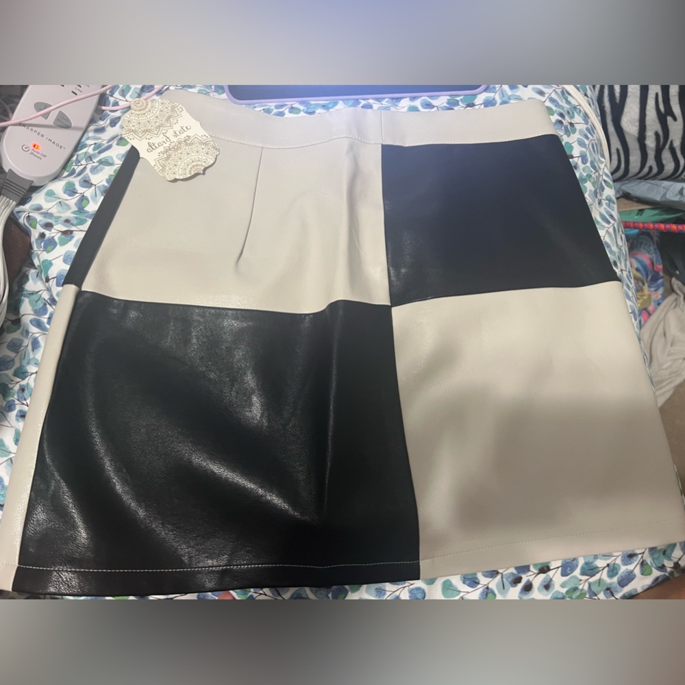 Black and cream leather skirt- tags still on it- size medium